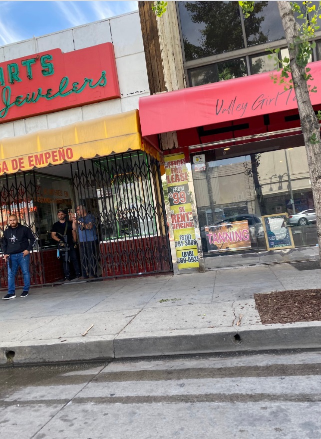 PHOTO Van Nuys Small Business Owners Standing In Front Of Their Property To Defend It