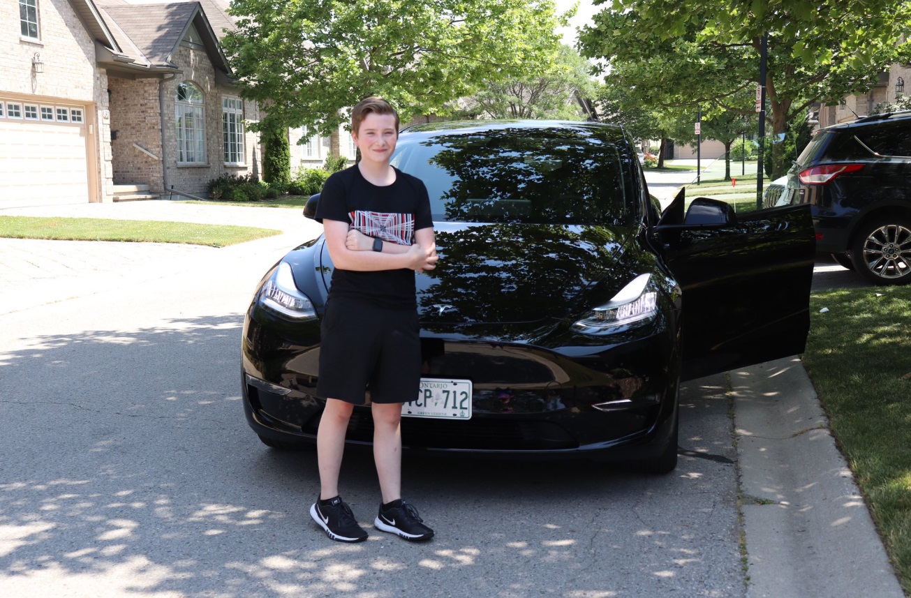 PHOTO 12 Year Old Rides In Tesla Model Y And Approves