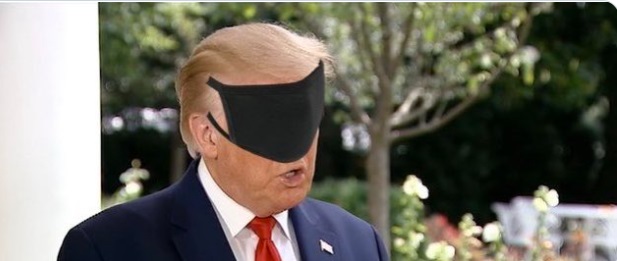 PHOTO Donald Trump Wearing A Face Mask Over His Eyes