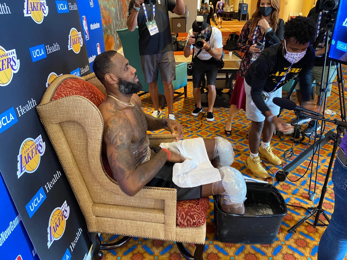 PHOTO Lebron James Icing His Feet In Bucket While Speaking To Media In Orlando