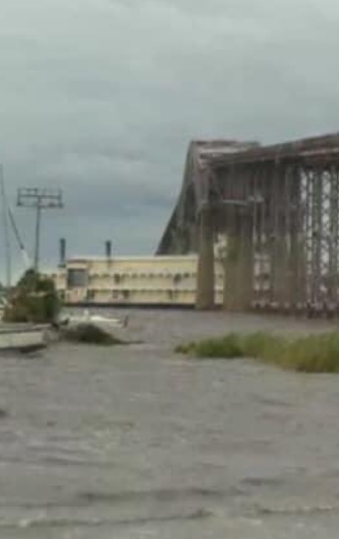 PHOTO Boat Stuck Under Collapsed Bridge In Lake Charles