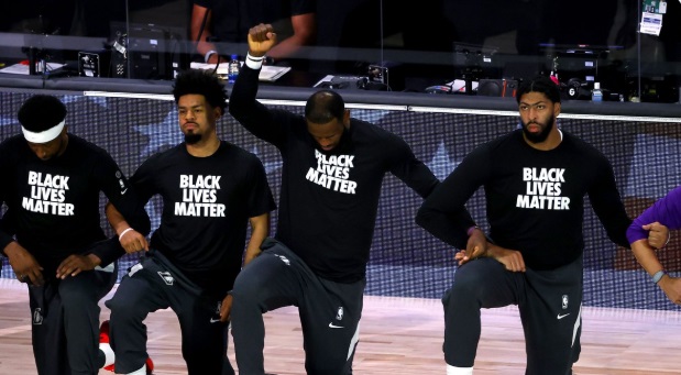 PHOTO Lebron James Raising His Hand In Protest