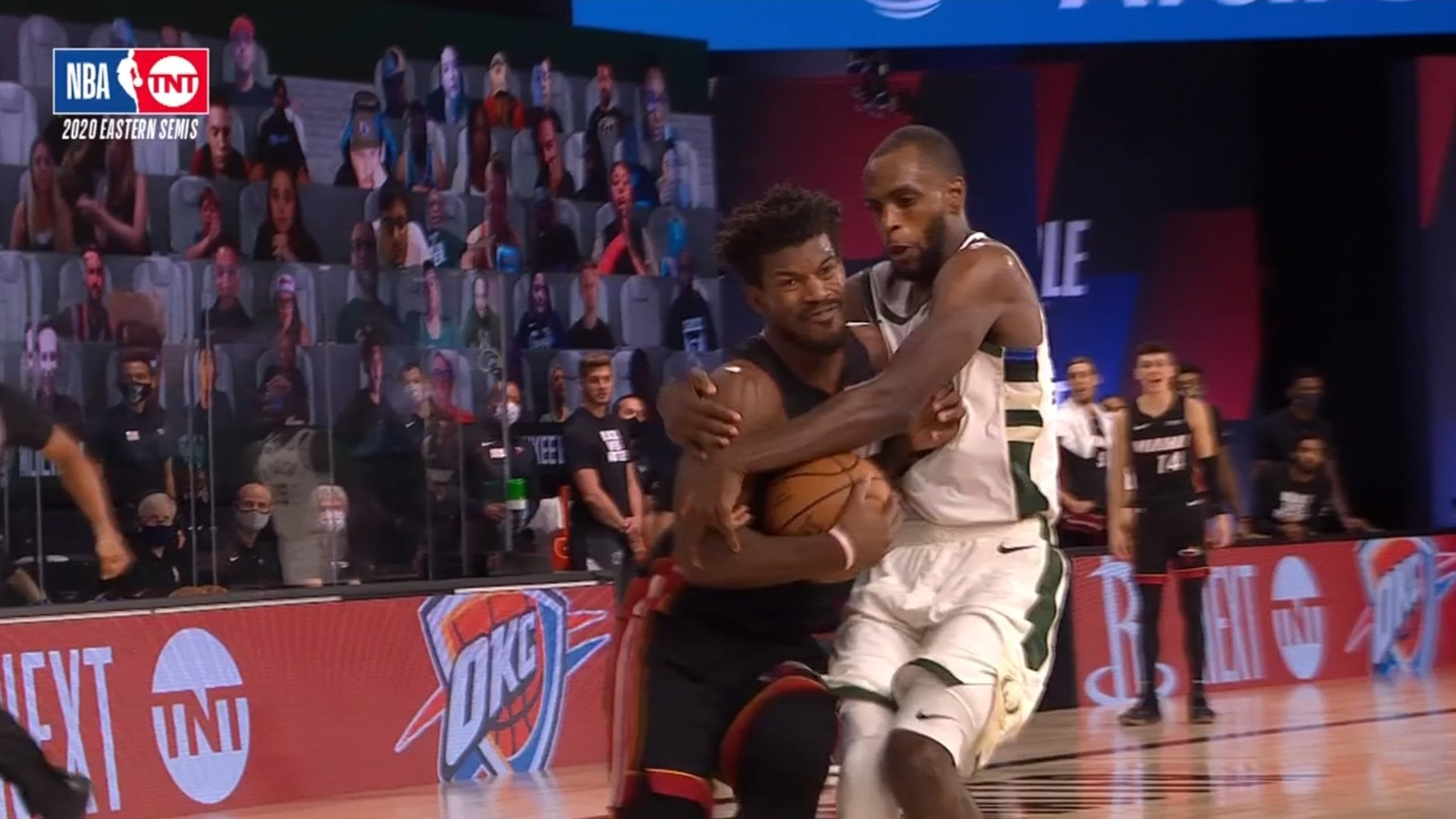 PHOTO Khris Middleton Hugging Jimmy Butler During Game