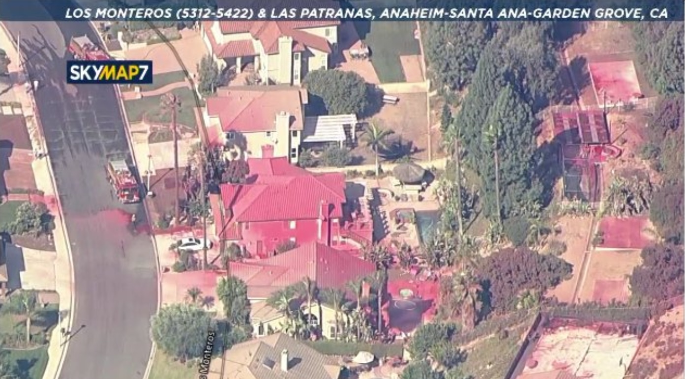 PHOTO Homes In Santa Ana Anaheim And Garden Grove Covered In Red Fire Retardant