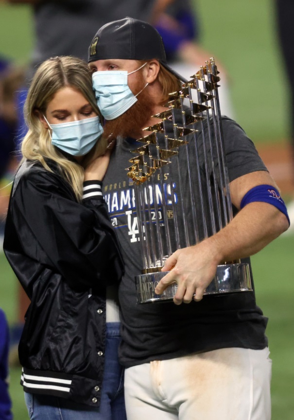 PHOTO Justin Turner Touching World Series Trophy And Hugging His Wife On Field After Game Despite Testing Positive For COVID-19