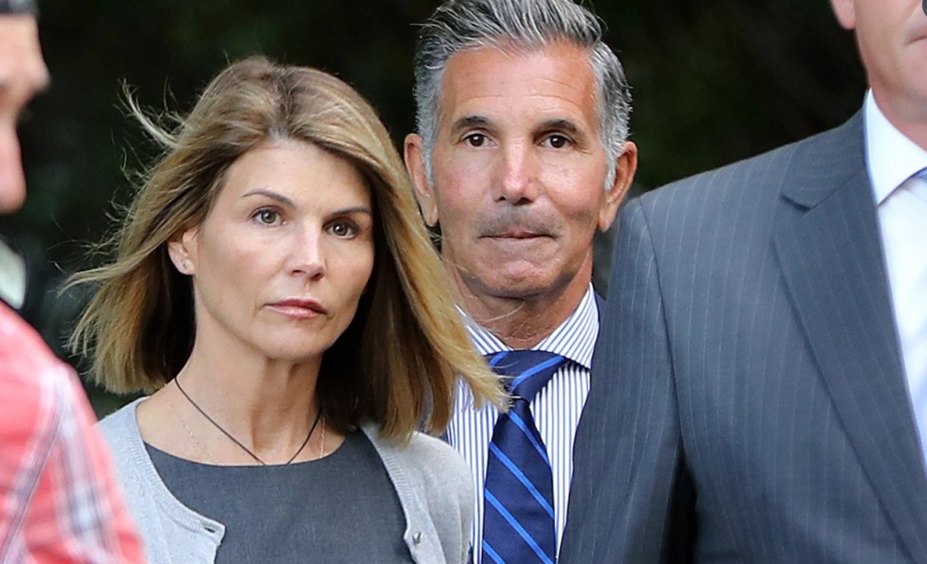 PHOTO One Of Lori Loughlin's Lawyers Smiling While She Walks Into Prison