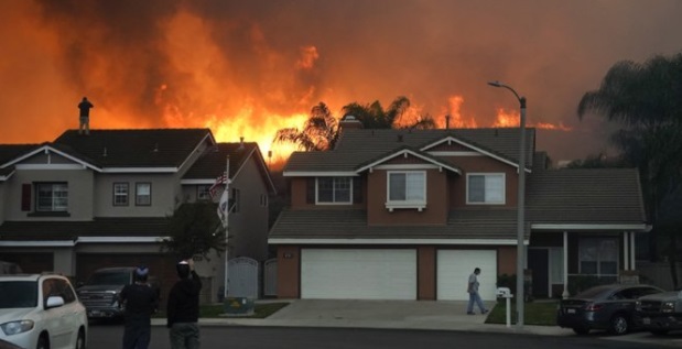 PHOTO Sad Homeowners Looking At Flames Behind Their Chino Hills Home