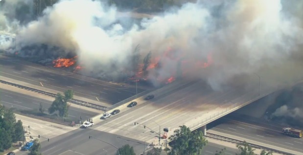 PHOTO Santa Ana Winds Blowing Smoke From Fire Onto Freeway Blinding Drivers