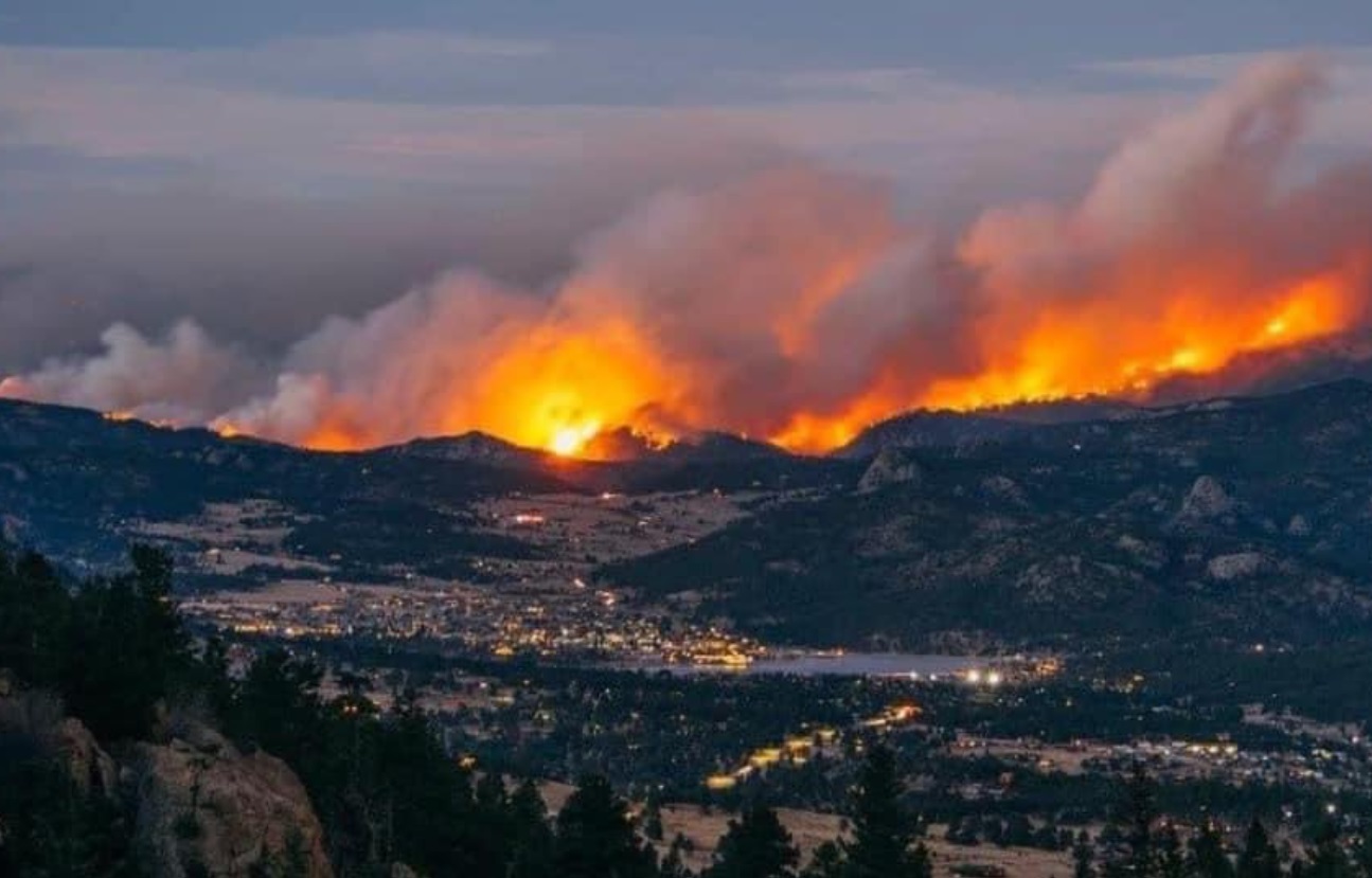 PHOTO Very Sad Zoomed Out View Of Rocky Mountain National Park Going Up Into Flames