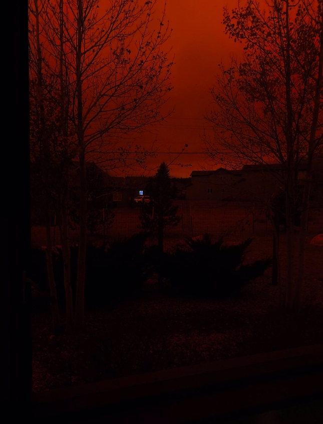 PHOTO View Outside A Window From House In Estes Park Shows Blackish Orange Sky From East Troublesome Fire Before Evacuation Was Ordered