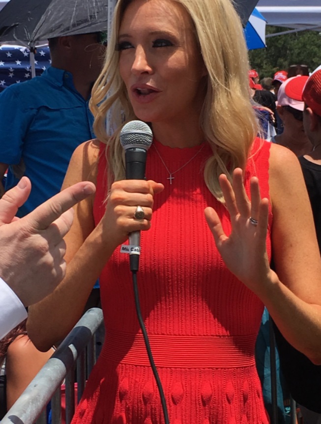 PHOTO Kayleigh McEnany Holding A Microphone Like She's President