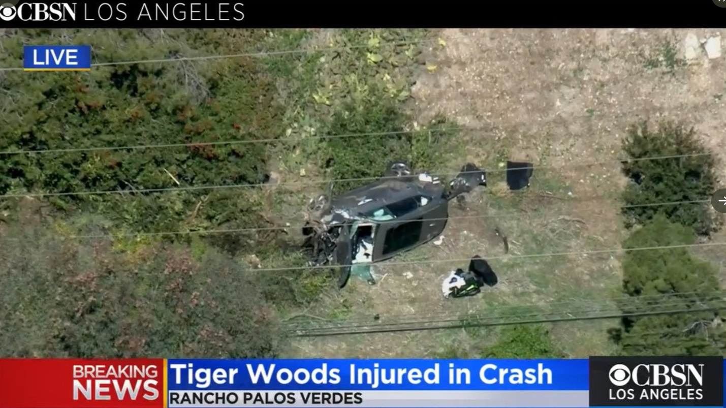 PHOTO Tiger Woods' Car Flipped Over In Debris On The Side Of The Road