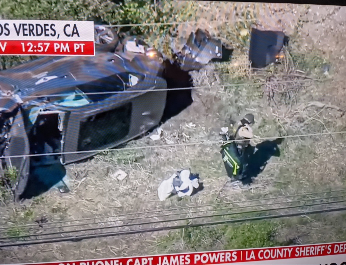 PHOTO Tiger Woods' Golf Clubs Laying A Foot Away From His Wrecked Car