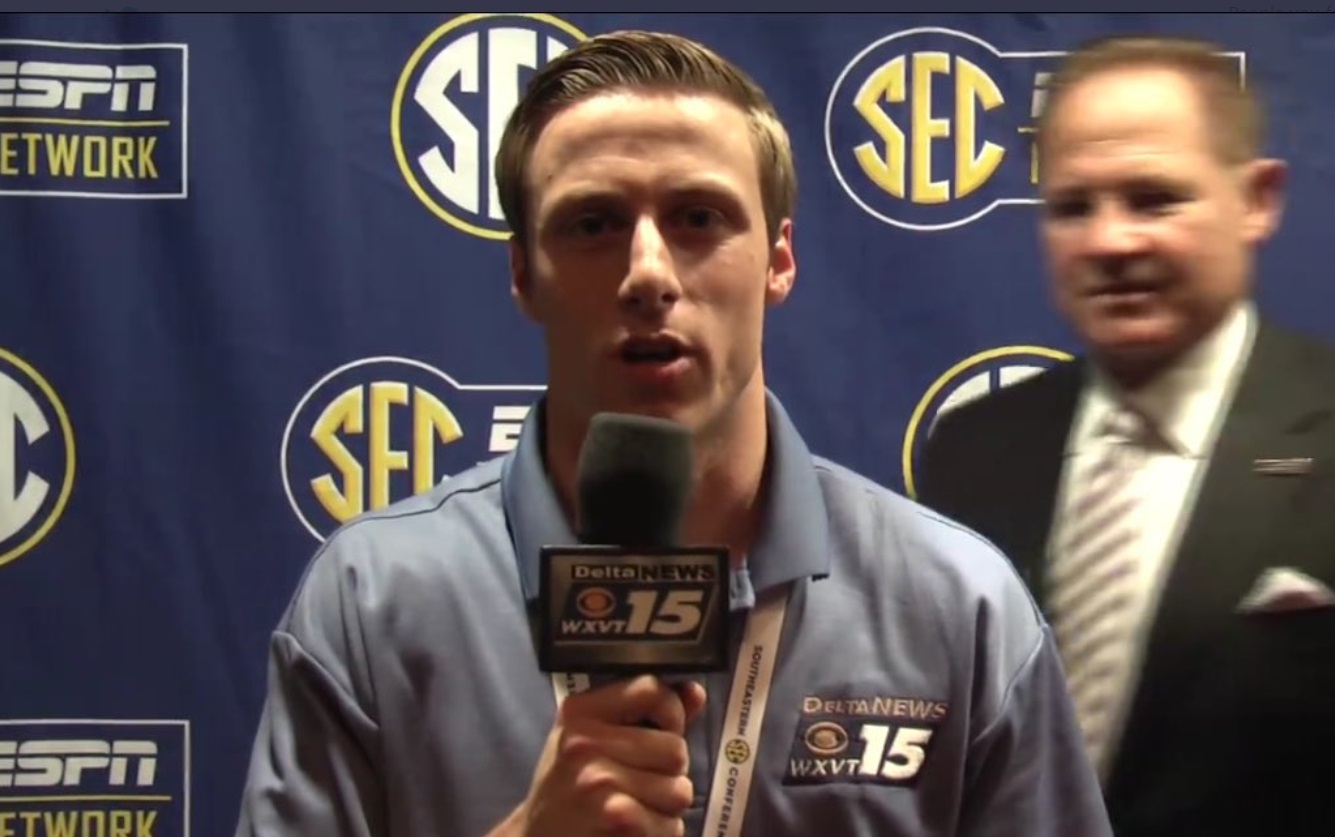 PHOTO Les Miles Creepily Sneaking Up On Local CBS Reporter In Baton Rouge