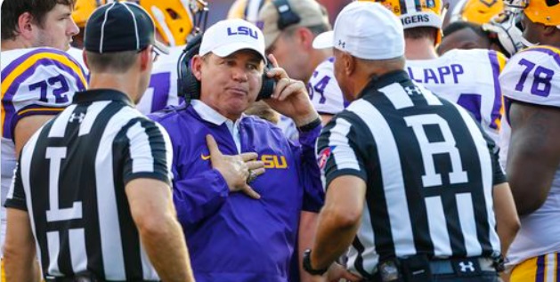 PHOTO Les Miles Looking At Refs During Game While He Was At LSU Like Who Me