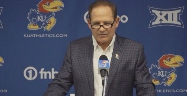 PHOTO Les Miles Looking Creepy At The Podium In Lawence Kansas Wearing Reading Glasses