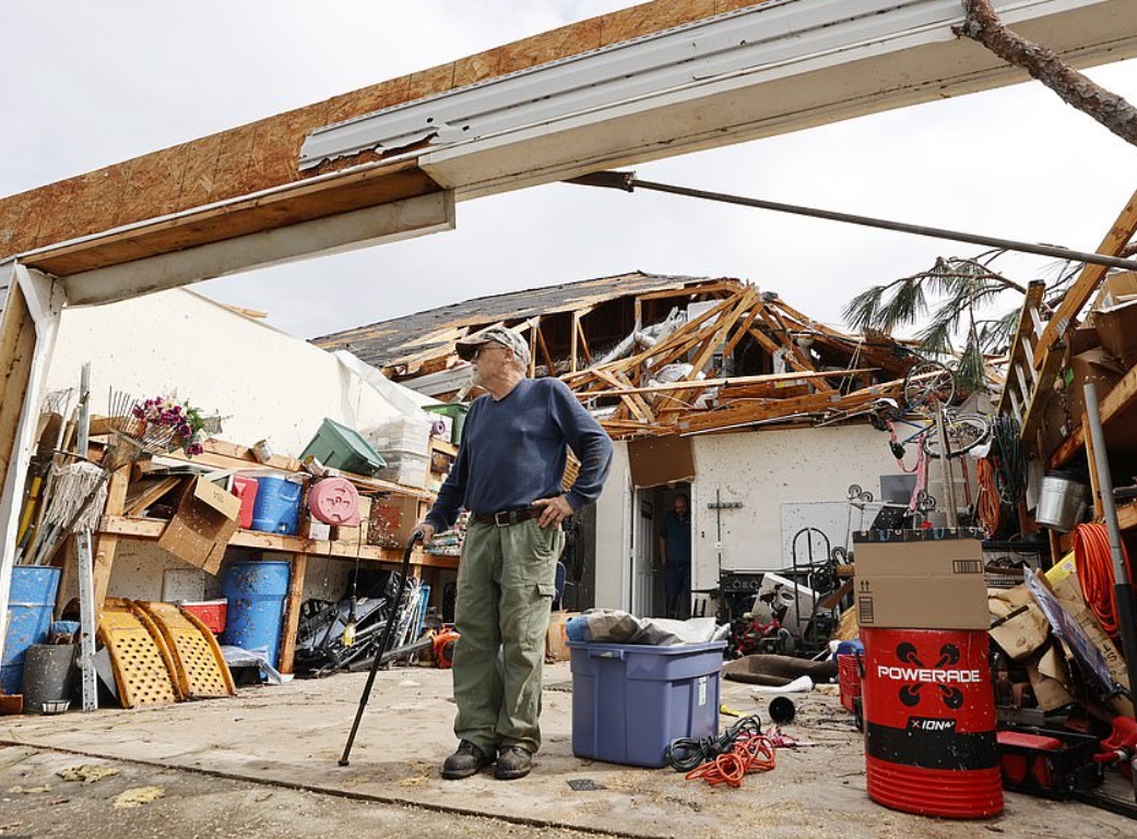 PHOTO Man Stands In Garage Of His Destroyed Home In Georgia After Tornado Hits