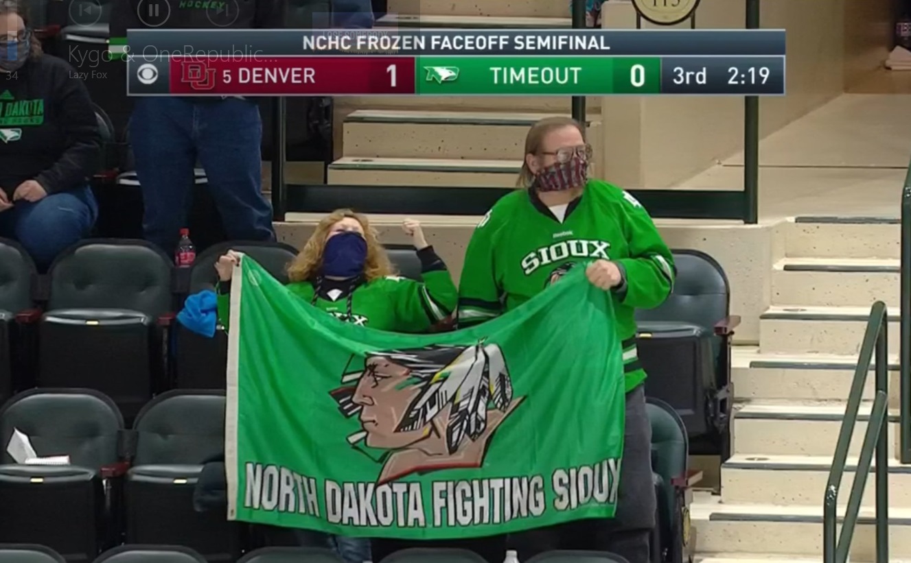 PHOTO ND College Hockey Fans Holding North Dakota Fighting Sioux Flag