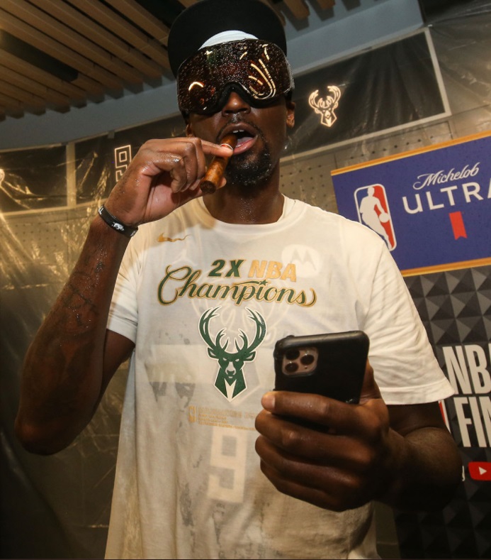 PHOTO Bobby Portis Smoking A Cigar While Drenched In Champagne