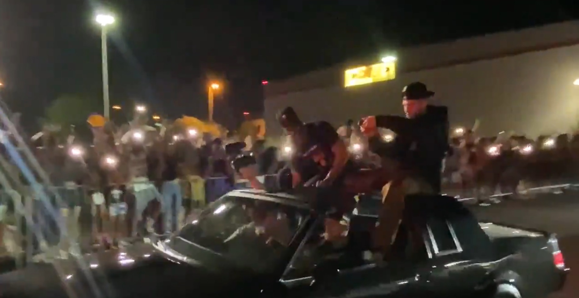 PHOTO Devin Booker And Chris Paul Sitting On Top Of Convertible Driving Through Fans Welcoming Team Back To Phoenix