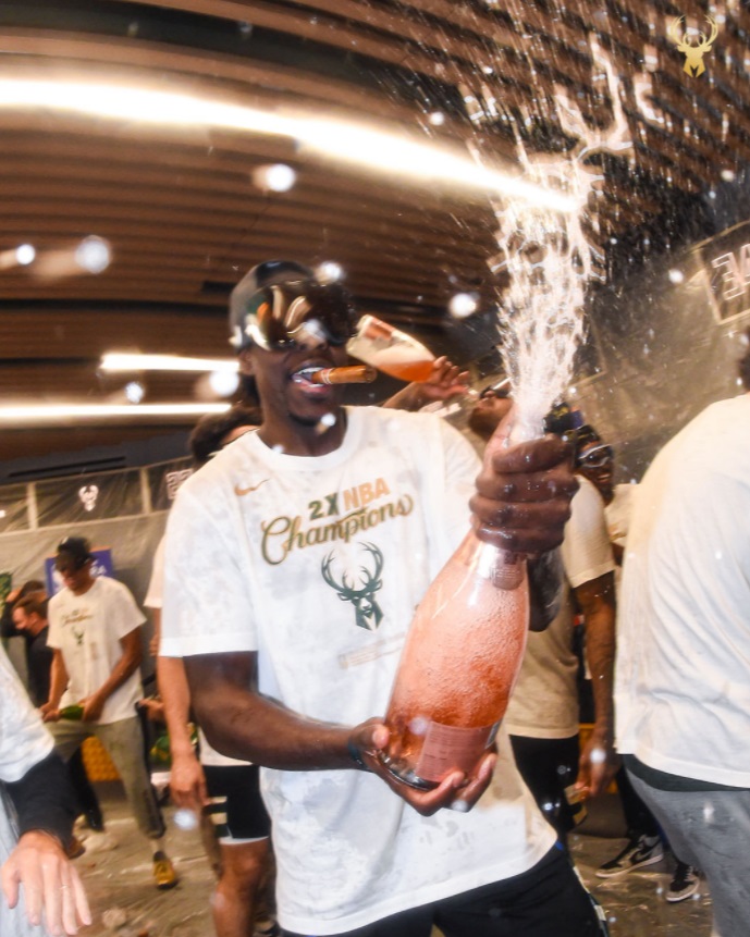 PHOTO Jrue Holiday With A Cigar AND Champagne