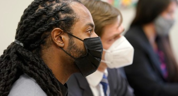 PHOTO Richard Sherman Intently Listening To Judge While Sitting In Court