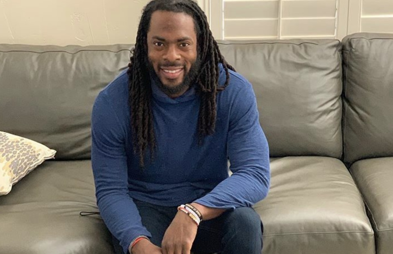 PHOTO Richard Sherman Sitting On His Couch In His House