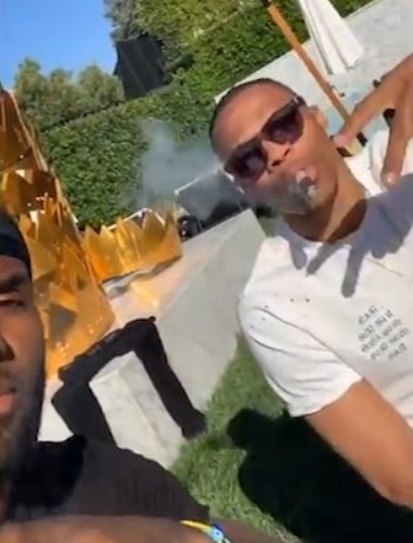 PHOTO Russell Westbrook Smoking A Cigar In Lebron's Backyard