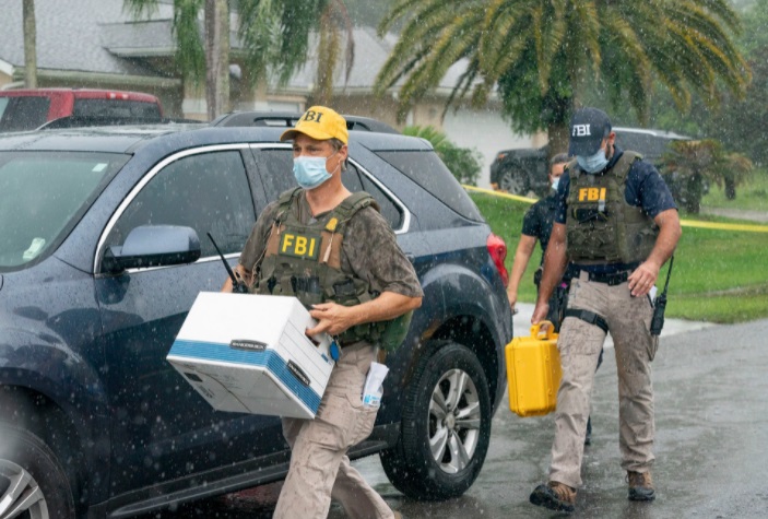 PHOTO FBI Carrying Boxes Of Brian Laundrie's Belongings Outside Of His Parents Him In Florida Today