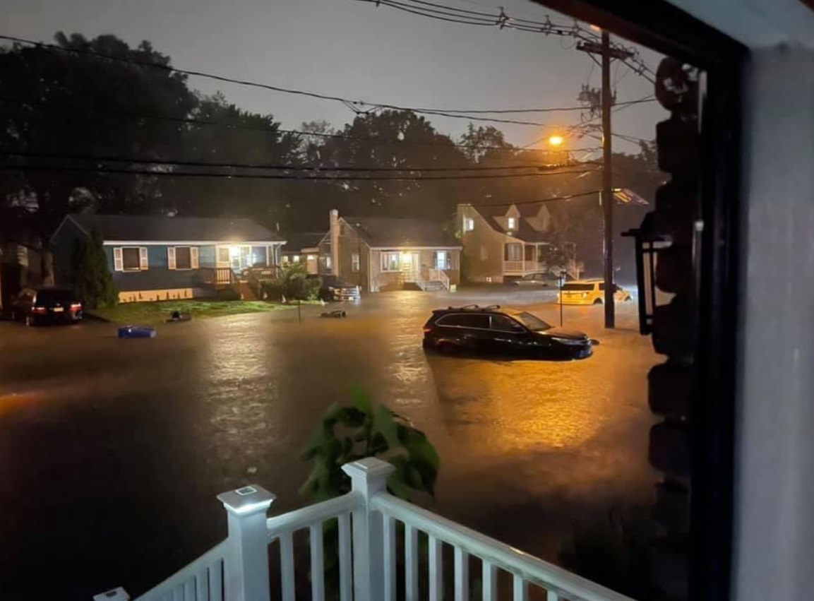 PHOTO Fireman Does Water Rescue In New Jersey With A Raft Due To Life Threatening Flooding