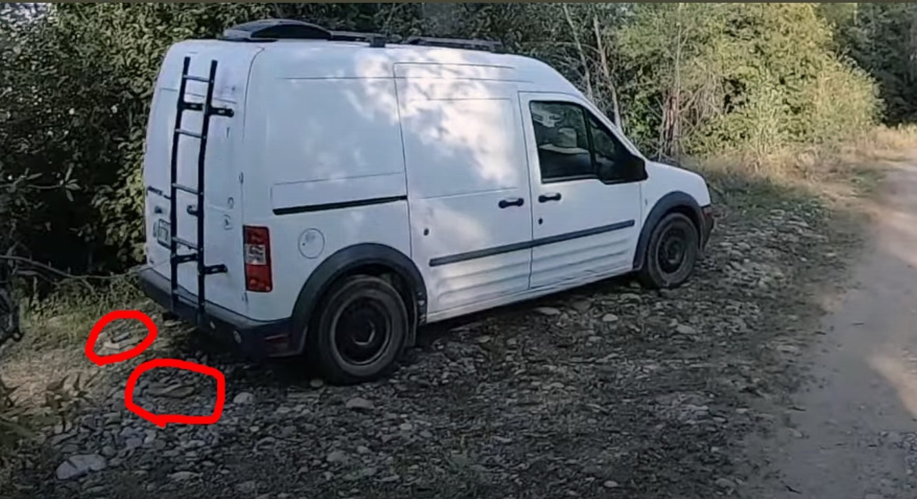 PHOTO Gabby Petito's Cell Phone And A Flip Phone Laying On The Ground At The Murder Scene