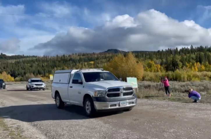 PHOTO Teton County Coroner Dr. Brent Blue Taking Gabby Petito's Body Out Of Teton National Park