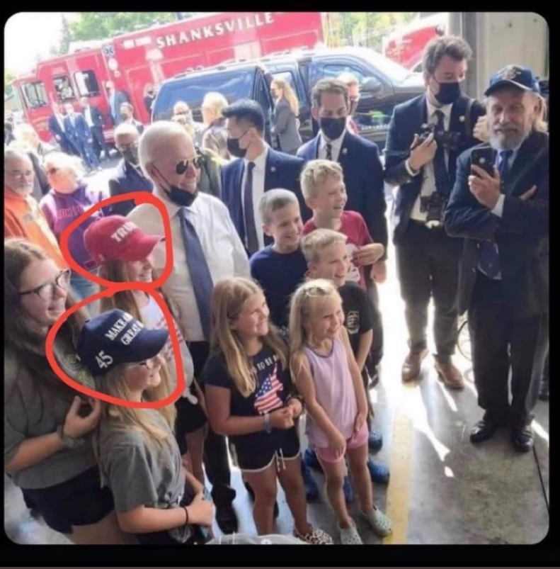 PHOTO Two Young Girls Wearing Trump Hats While Taking Picture With Joe Biden