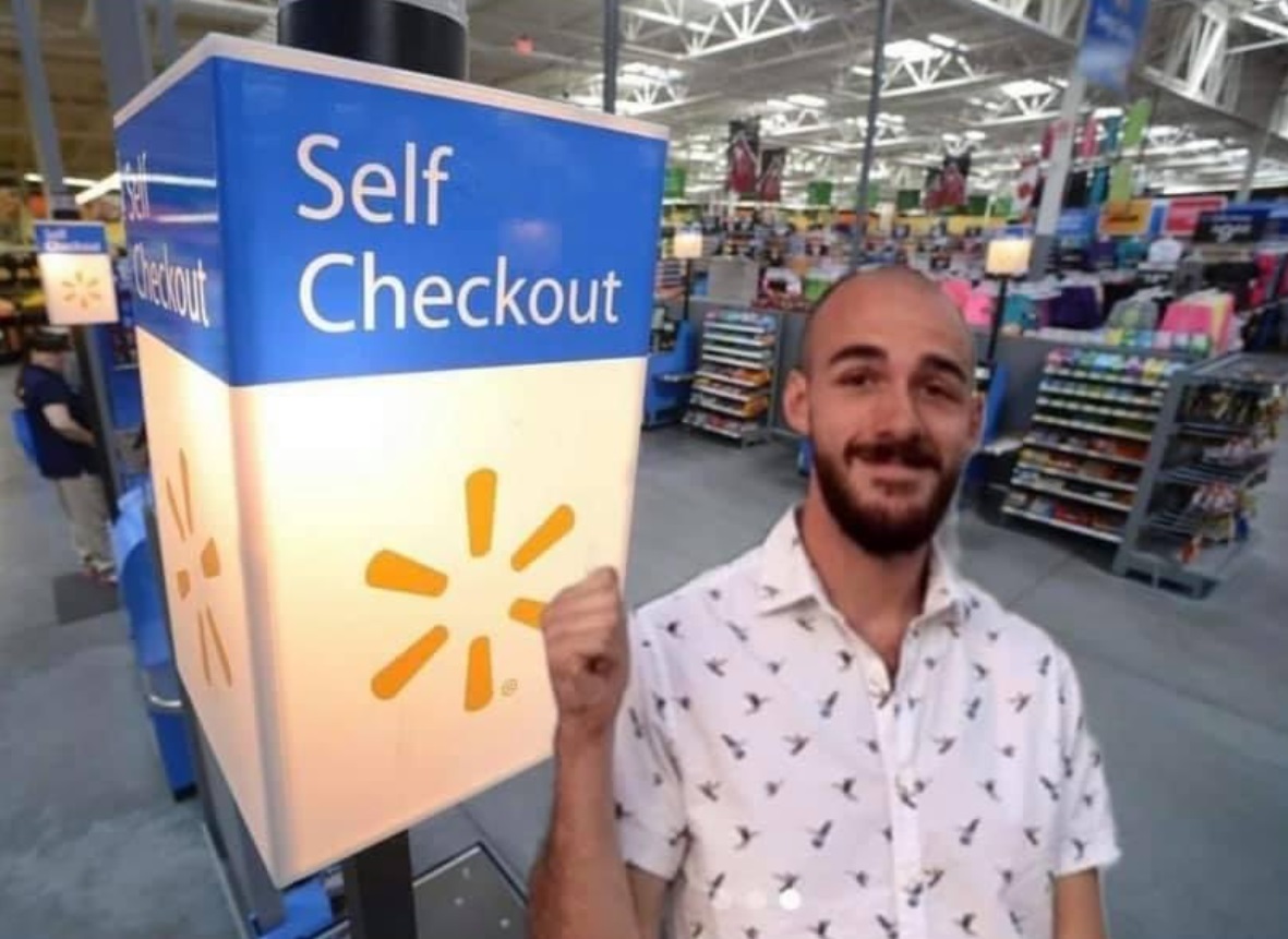 PHOTO Brian Laundrie At The Self Checkout At Walmart Before He Committed Suicide