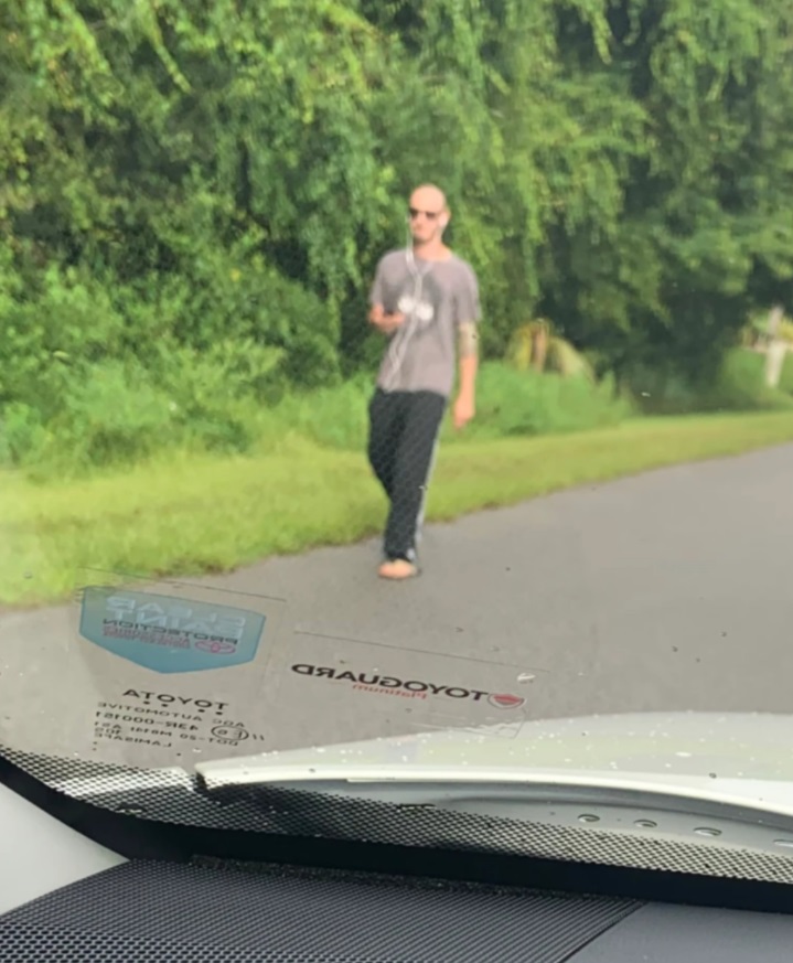 PHOTO Brian Laundrie Running Down The Street In Florida Wearing Flip Flops Before Hiding In Heavy Terrain Nearby