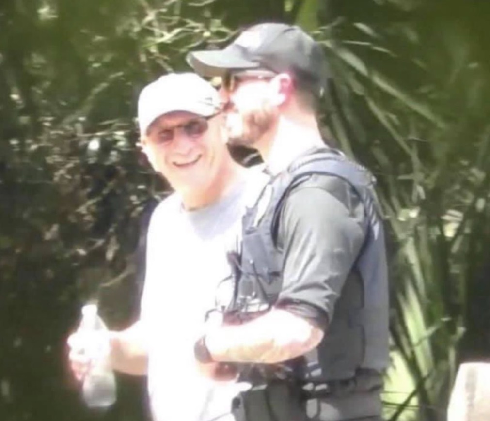PHOTO Brian Laundrie's Dad Laughing While Out Pretending To Look For His Son With Law Enforcement