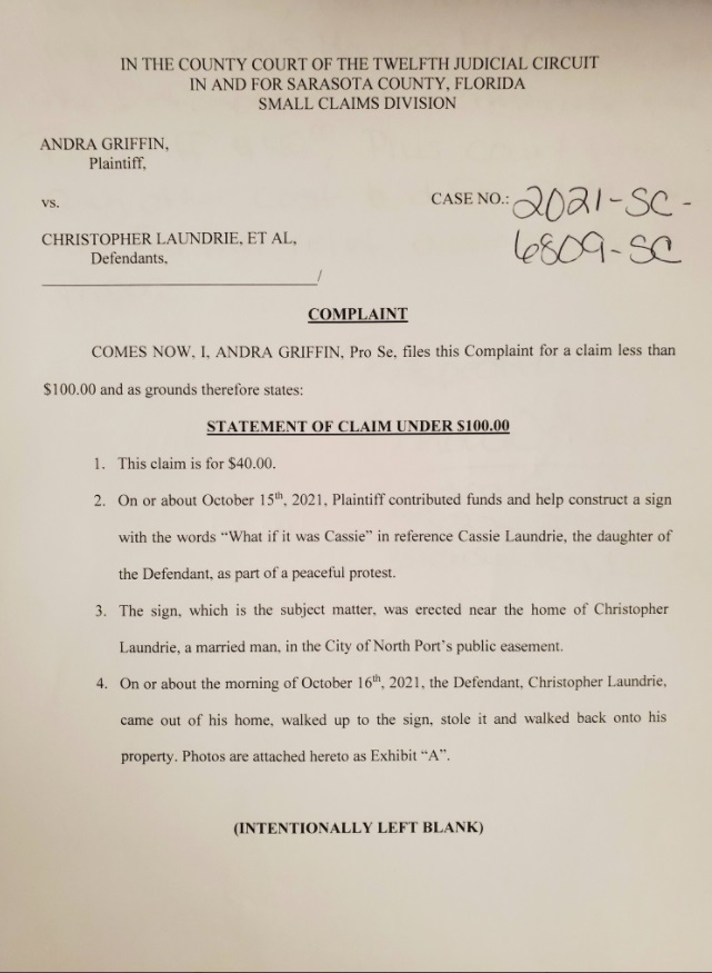 PHOTO Christopher Laundrie Being Sued For Stealing Poster From Protester Hearing Is December 1 In Sarasota County Court