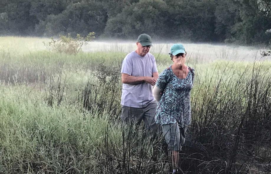 PHOTO Of Brian Laundrie's Parents Leading Police To Brian Laundrie's Location In Myakkahatchee Creek Environmental Park