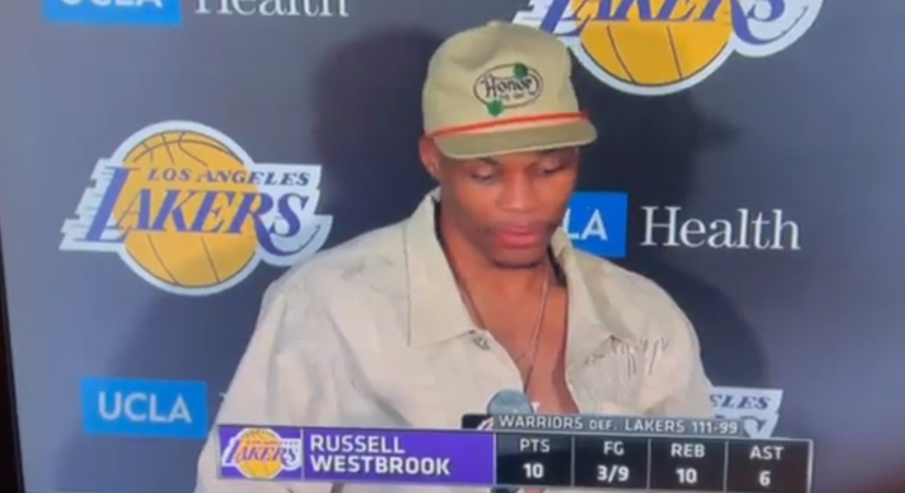 PHOTO Russell Westbrook Wearing A Honor Hat With Green Roses On It Post-Game