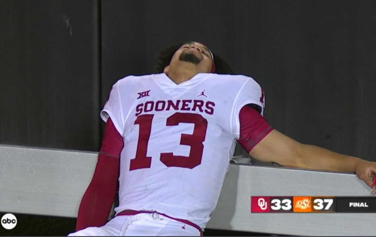 PHOTO Caleb Williams Passed Out And Went To Sleep On The Bench After OU Lost To OSU