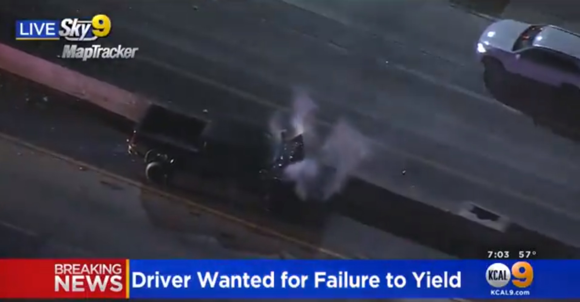 PHOTO Front Of Chevy Silverado Smoking Badly As Driver Lays Limp Inside Truck After Police Chase In Los Angeles