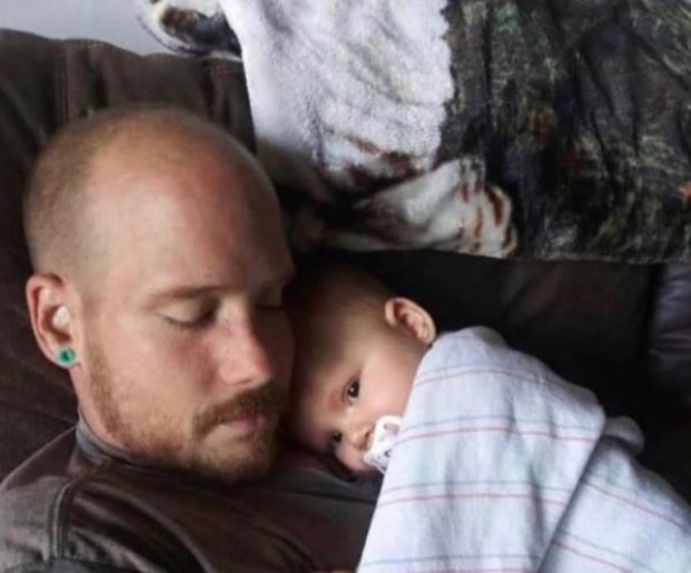 PHOTO Joseph Rosenbaum Holding Child That He Abused Pretending To Take Care Of It