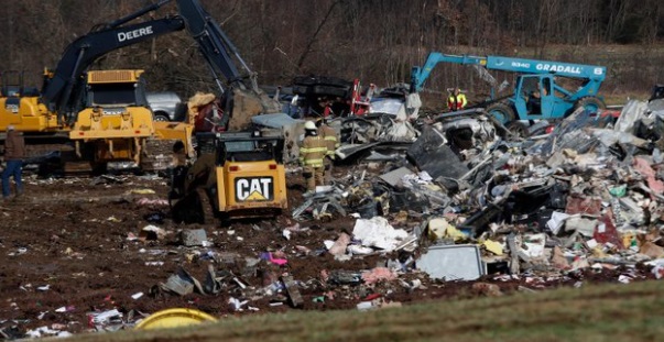 PHOTO Bulldozer Being Used To Sort Through Candle Factory Debris In Mayfield Kentucky