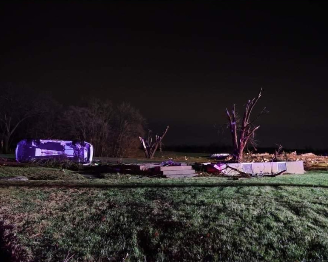 PHOTO Car That Was Parked Upright Laying On Its Side After EF5 Tornado In Mayfield Kentucky