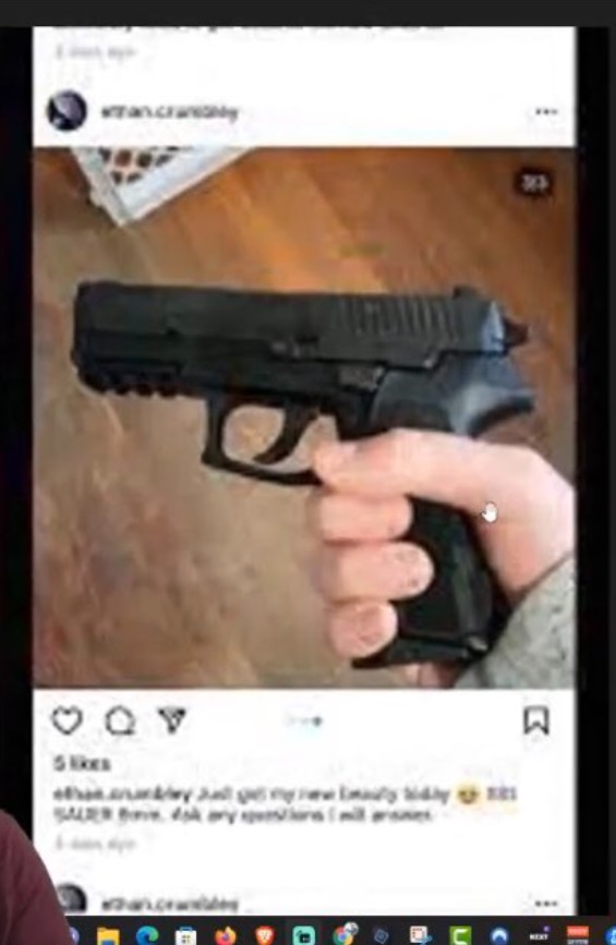 PHOTO Ethan Crumbley Holding Loaded Hand Gun In His Bedroom