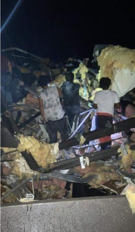 PHOTO Rescue Workers Pulling People From Under Debris In Mayfield Kentucky