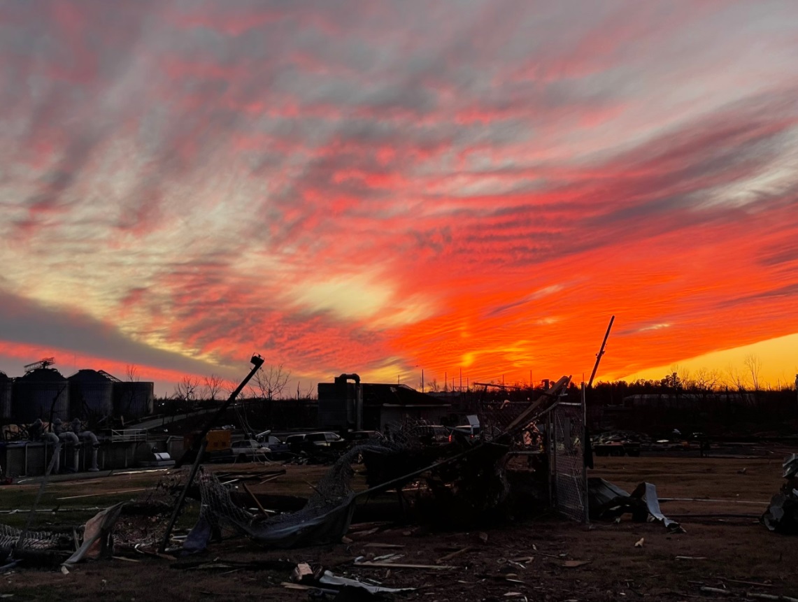 PHOTO Unbelievable Sunset Over Mayfield Kentucky As Victims Of Tornado Salvage Any Belongins They Can From Wreckage