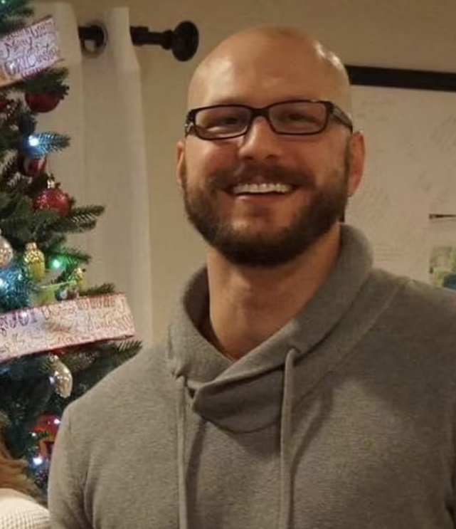 PHOTO Matthew LaFountain In Front Of His Christmas Tree At Christmas Time