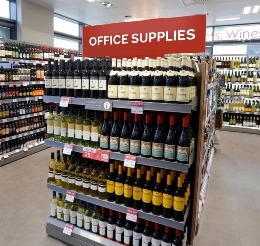 PHOTO Office Supplies Sign Where The Wine Is Inside Store