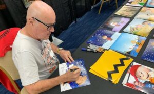 PHOTO Peter Robbins Signing Autographs For Christmas